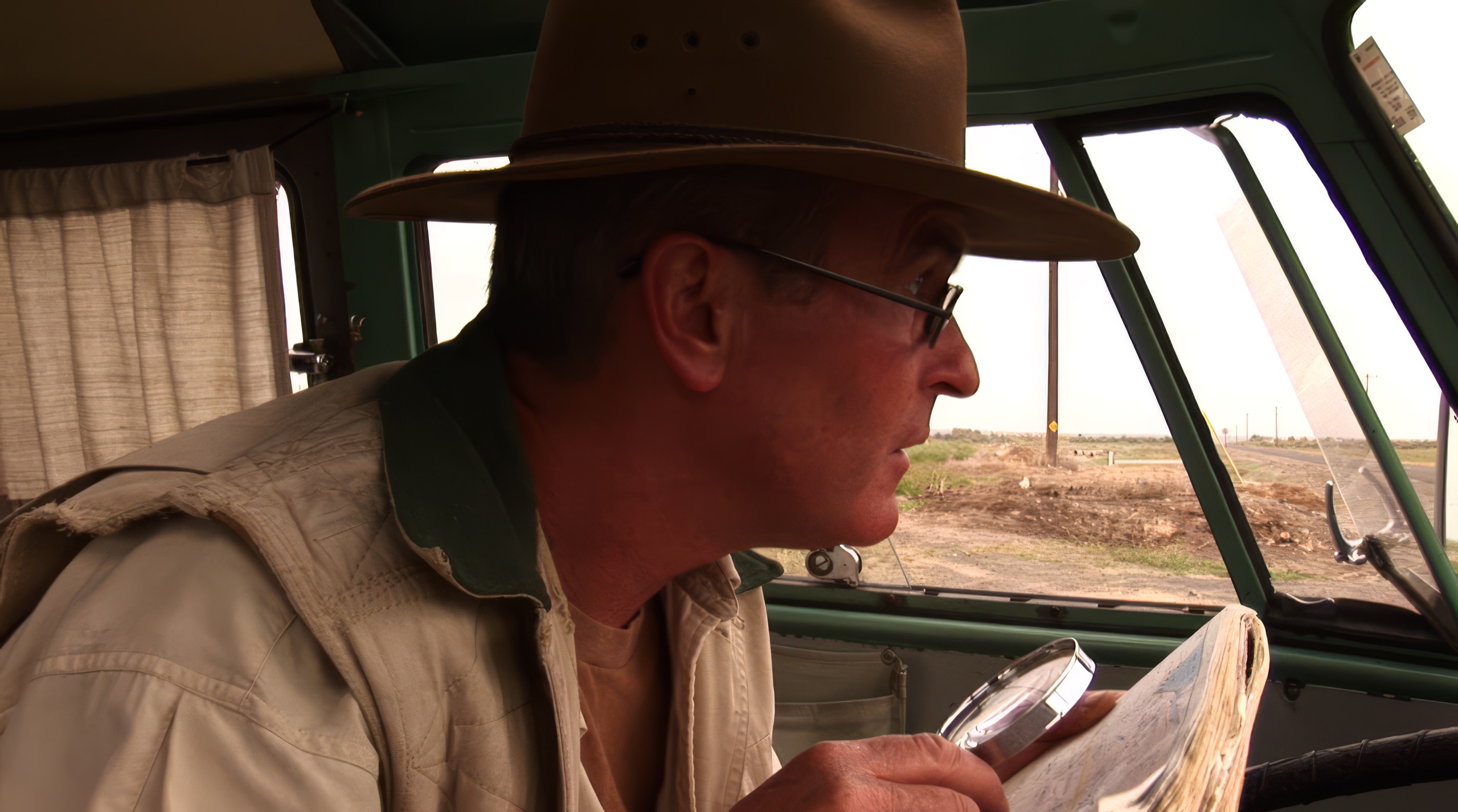 Gordon Hempton in his VW, scanning maps for new places to record.